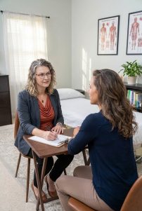 Patient working with a provider at a pelvic floor physical therapy clinic in McLean
