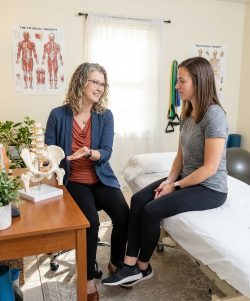 Patient working with a provider at a pelvic floor physical therapy clinic in Bethesda