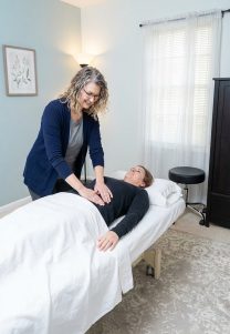 Patient working with a provider at a pelvic floor physical therapy clinic in Leesburg
