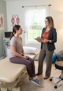 Patient working with a provider at a pelvic floor physical therapy clinic in McLean