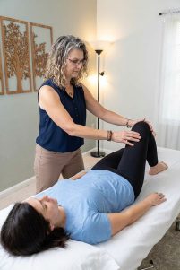 Patient working with a provider at a pelvic floor physical therapy clinic